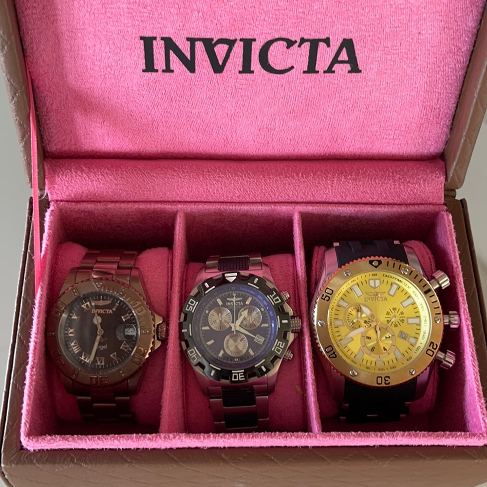 All 3 Invicta watches included. Case also included. Two women’s one men’s watch.